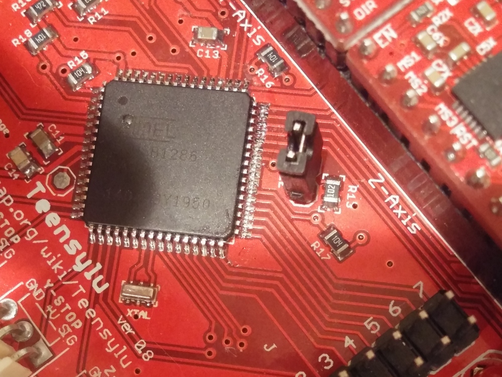 Processor side nearest programming jumper shows bad solder.