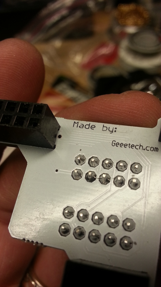 messy solder joint is electrically joining two pins that shouldn't be