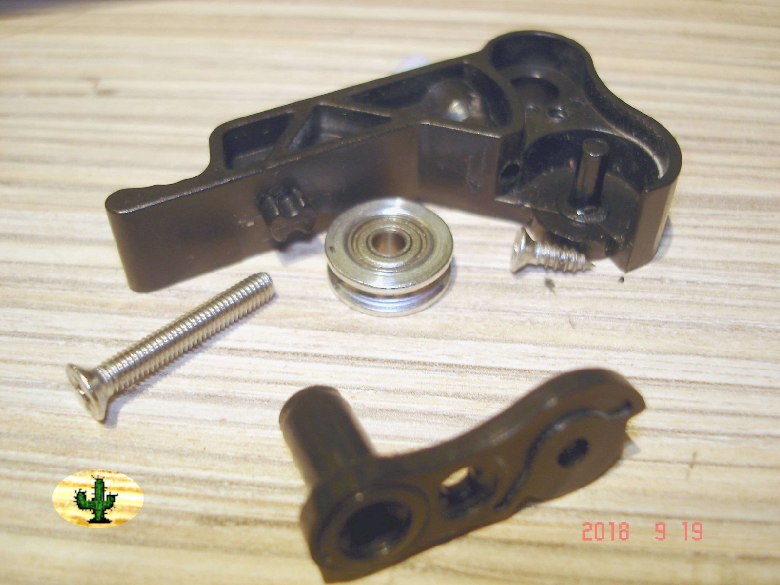 Disassembled feeder mechanism.