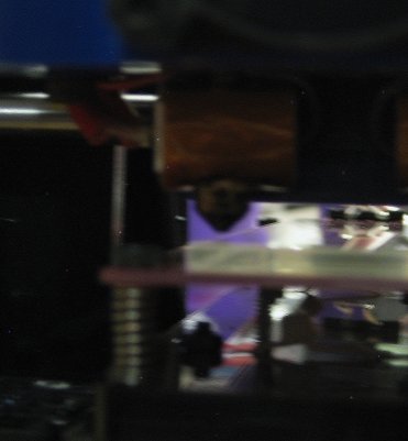 The nozzle is not making contact with the heat bed at 95 degrees. The separation is around 1mm.